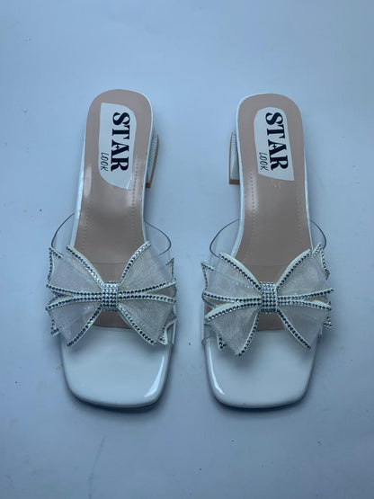 RADIANT BOW MUSE HEELS